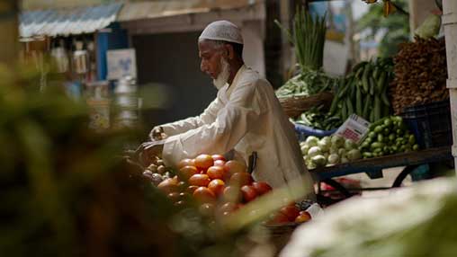 street vendor selling produce in India